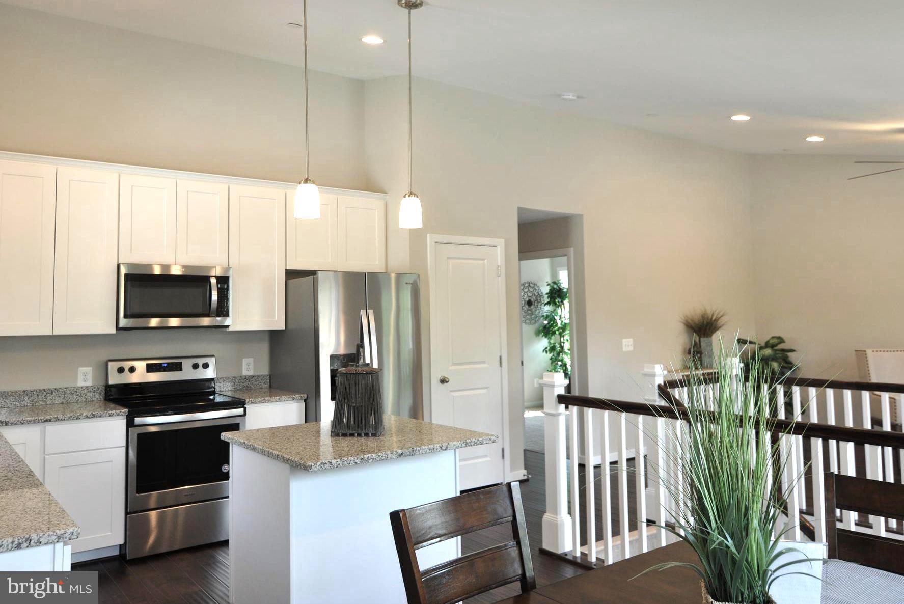 213 Meadow Road Pasadena, MD 21122 - Photo 11 of 30 Stainless Appliances . Designer Pendant Lighting