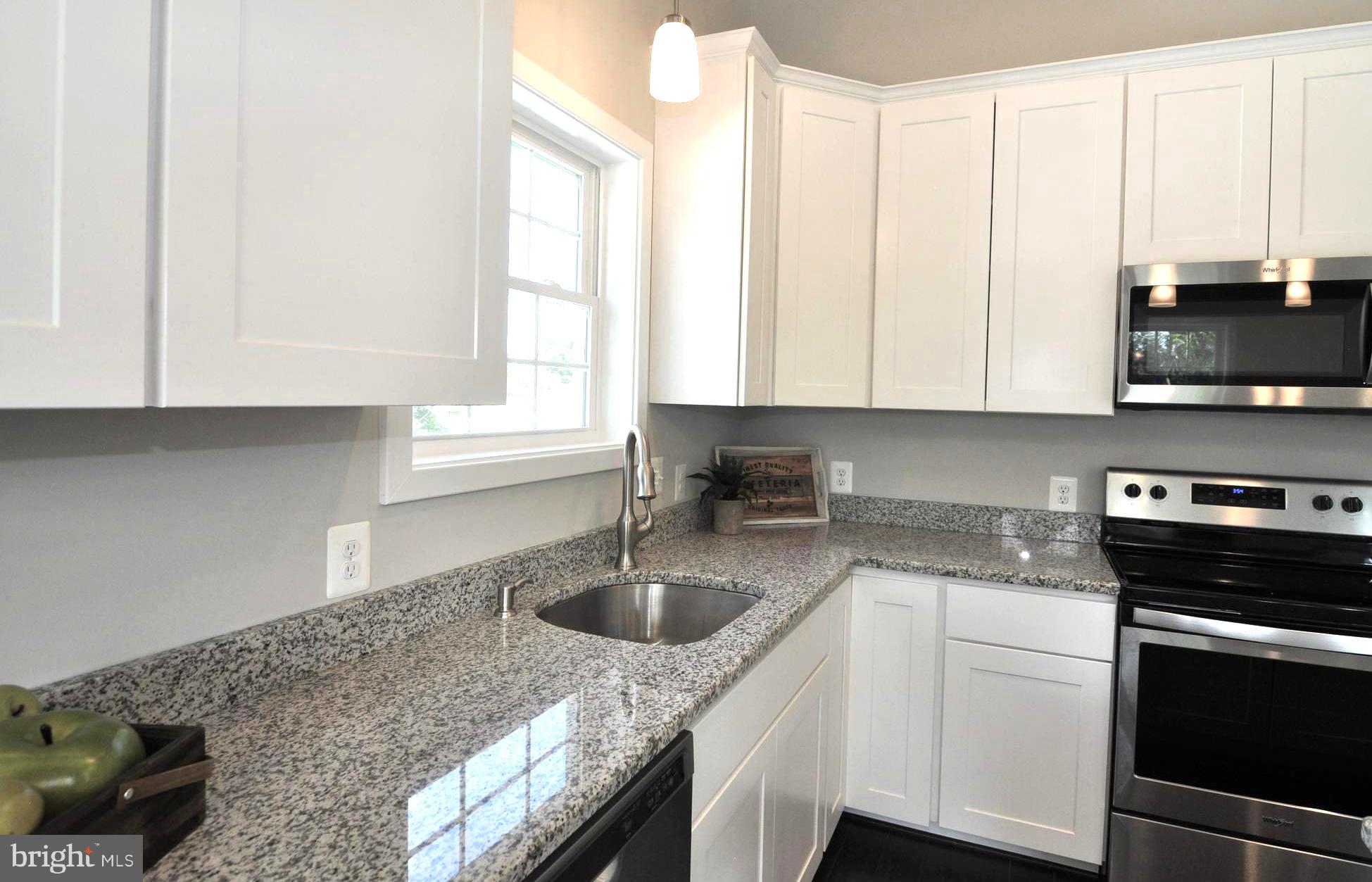 213 Meadow Road Pasadena, MD 21122 - Photo 12 of 30 Bright White Cabinetry . Sleek Granite Counters