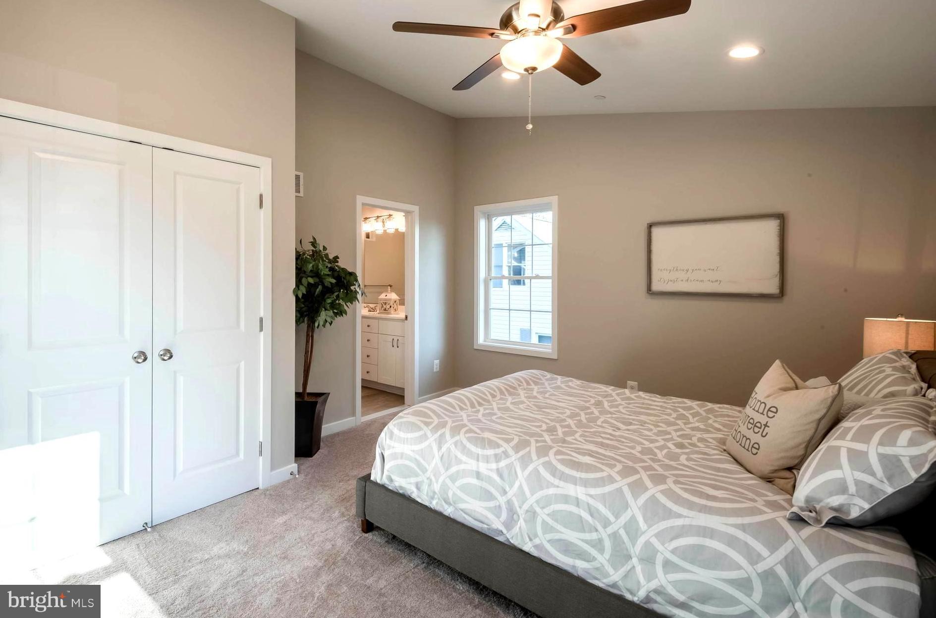 213 Meadow Road Pasadena, MD 21122 - Photo 15 of 30 Vaulted Ceiling with Bombay Ceiling Fan