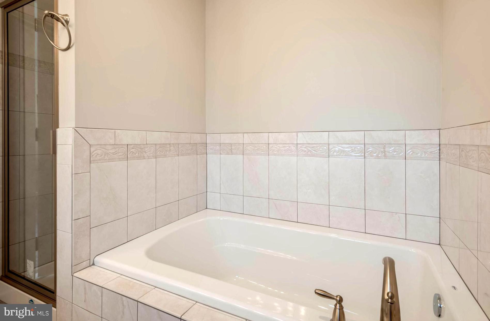 213 Meadow Road Pasadena, MD 21122 - Photo 17 of 30 Master Bath Decorative Tile Spa Tub . Shower