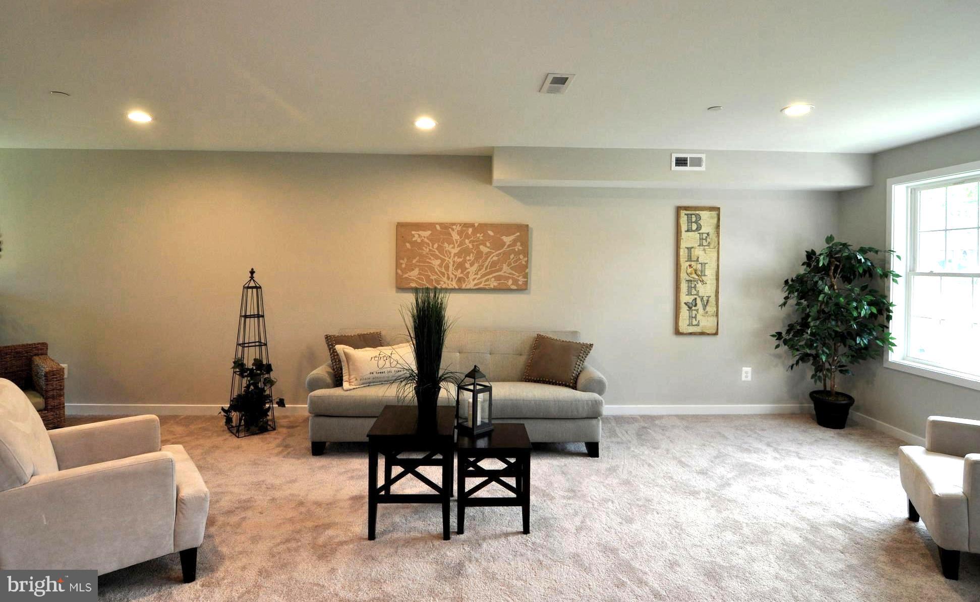 213 Meadow Road Pasadena, MD 21122 - Photo 22 of 30 Expansive Living/Media Area . Recessed Lighting