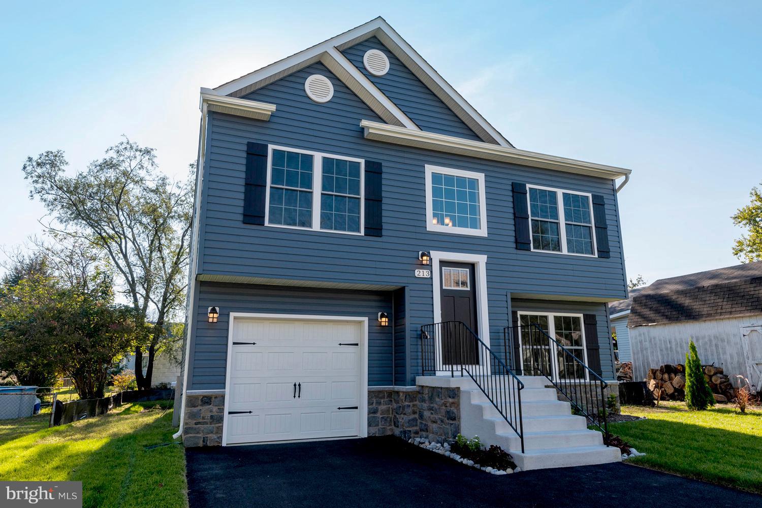 213 Meadow Road Pasadena, MD 21122 - Photo 4 of 30 Stone/Siding Exterior . Newly Sodded Lawn
