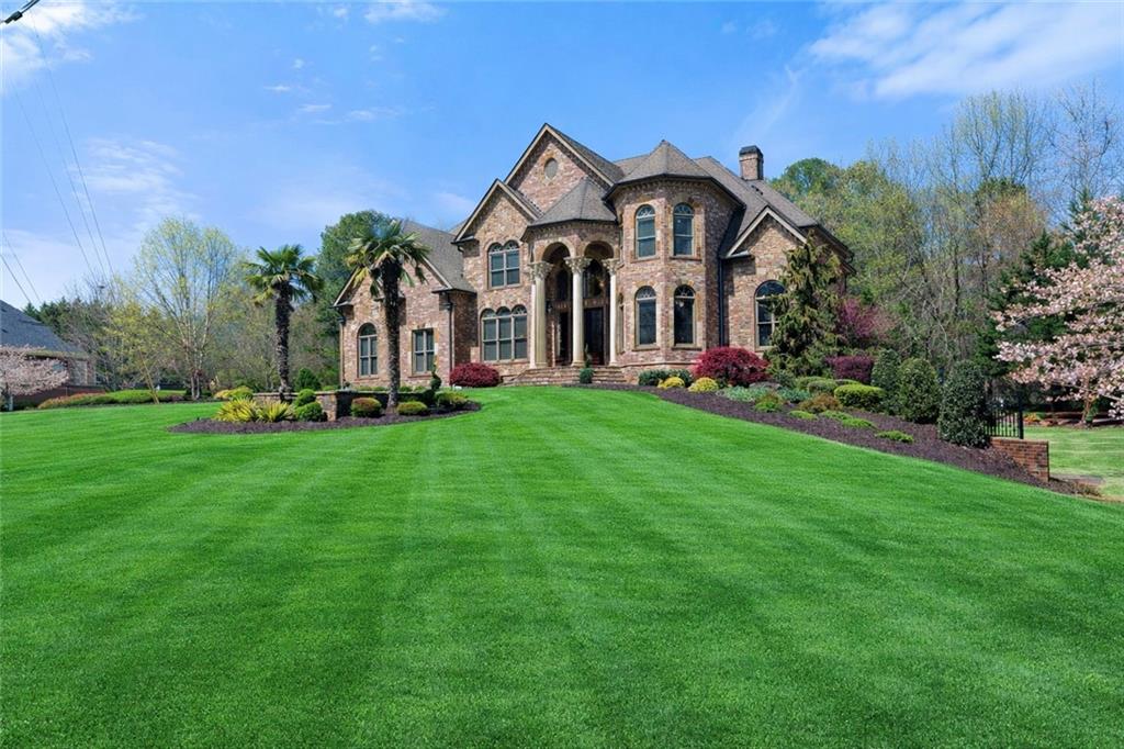 1310 Settles Road Suwanee, GA 30024 - Photo 1 of 71