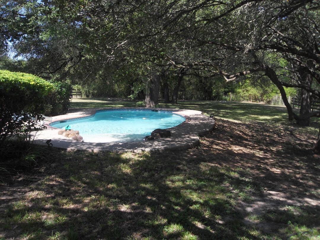 8456 Schuster Road Ledbetter, TX 78946 - Photo 37 of 49 a view of backyard with green space