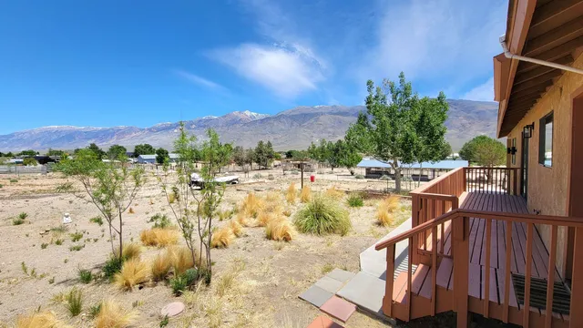 a view of swimming pool with a patio