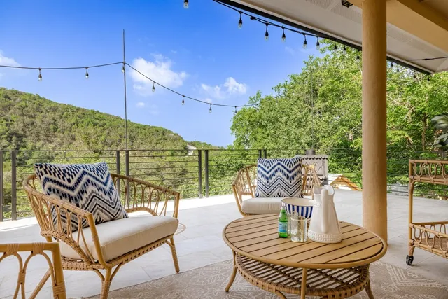a outdoor living space with furniture and a potted plant