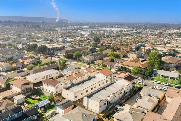 an aerial view of a city with lots of residential buildings