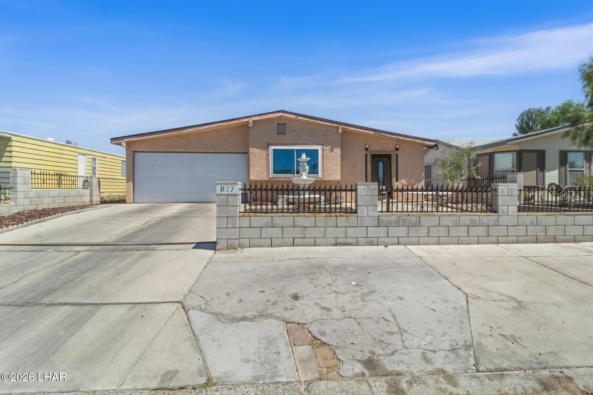 827 Ramar Road Bullhead City, AZ 86442 - Photo 1 of 34 Front