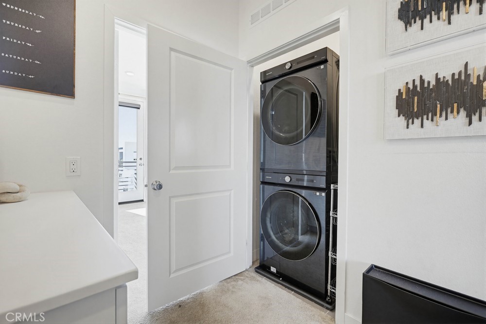 104 Restore Irvine, CA 92618 - Photo 22 of 35 Double stacked Laundry between the two bedrooms