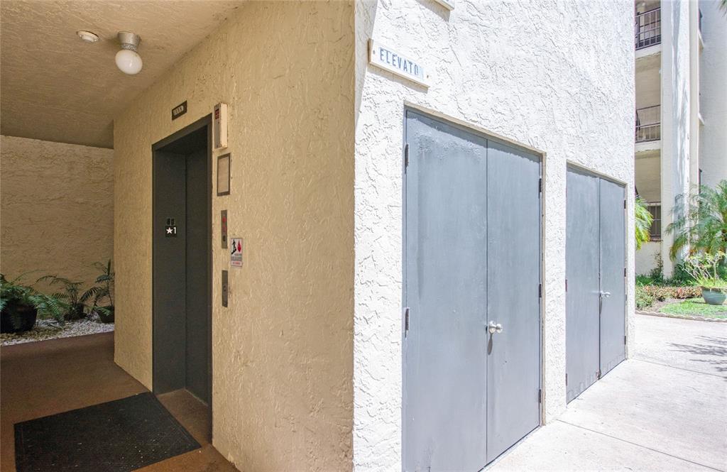 700 Starkey Road, Unit 1145 Largo, FL 33771 - Photo 60 of 63 a view of a bathroom from a hallway