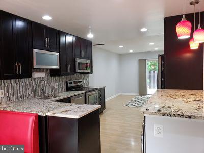 1329 Northgate Square Reston, VA 20190 - Photo 1 of 36 Kitchen Accessed From Front and Back Patios