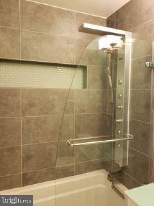 1329 Northgate Square Reston, VA 20190 - Photo 27 of 36 Hall Bath Rain Shower and Full Body Spray