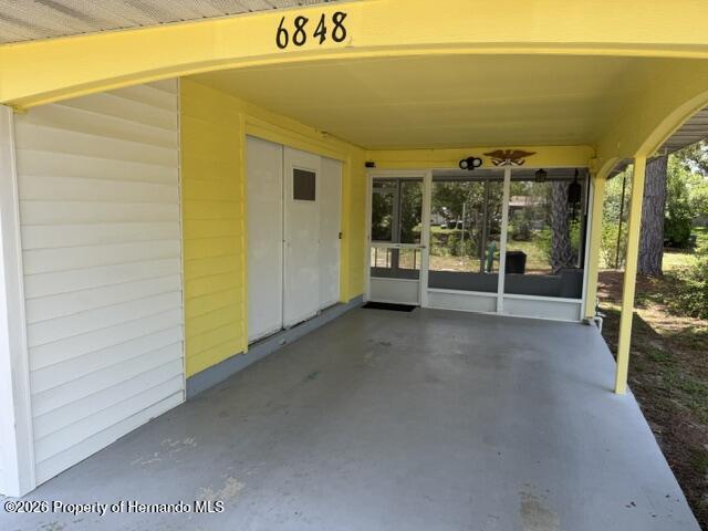 6848 Treehaven Drive Spring Hill, FL 34606 - Photo 4 of 34 Carport