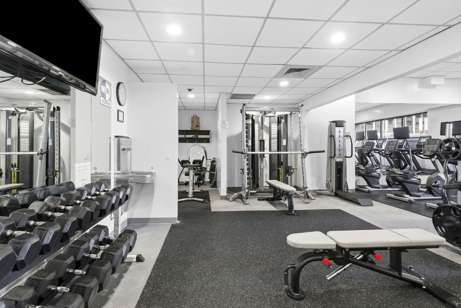 1030 North State Street, Unit 35K Chicago, IL 60610 - Photo 17 of 28 a view of a room with gym equipment
