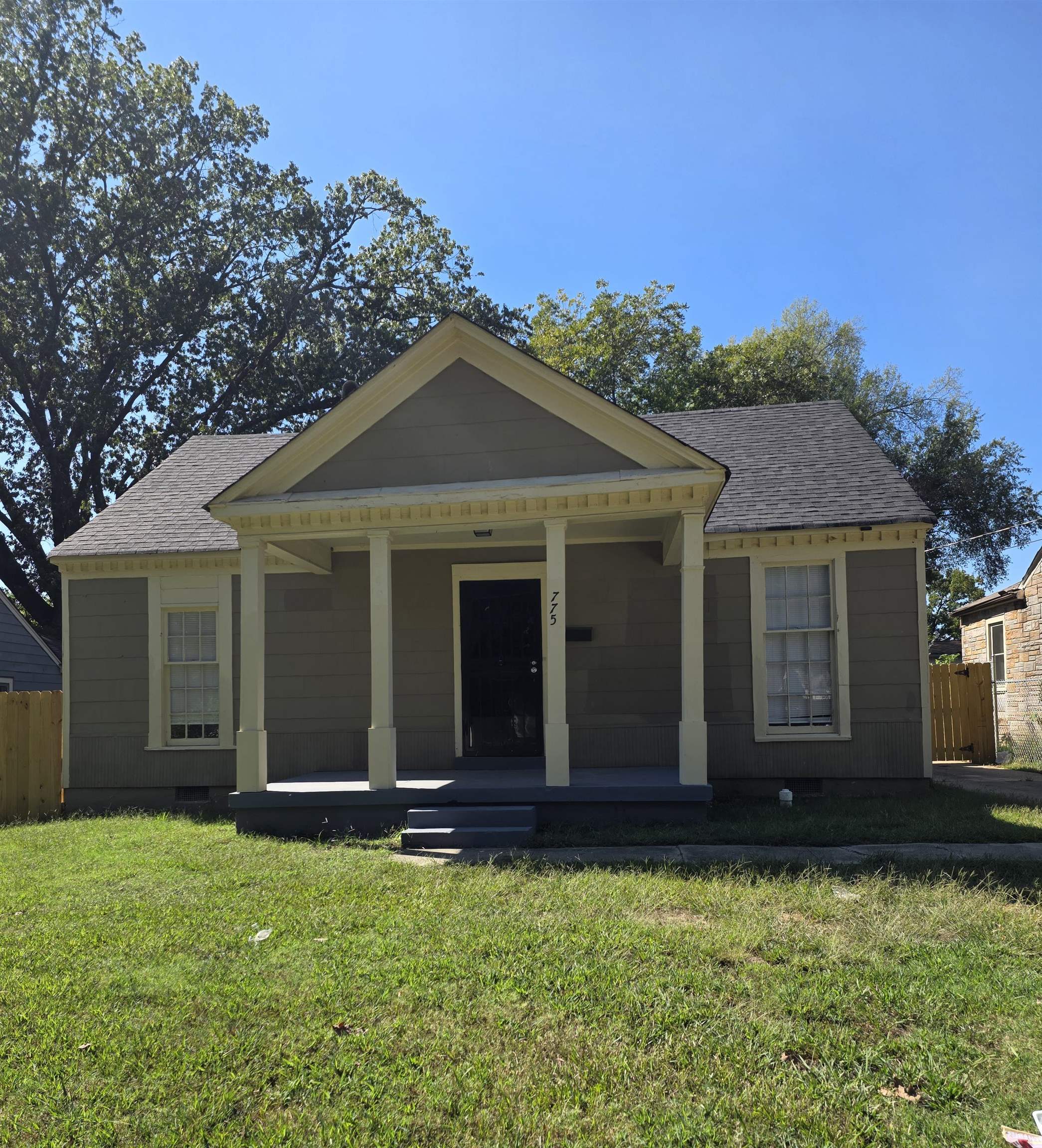 a view of a house with garden
