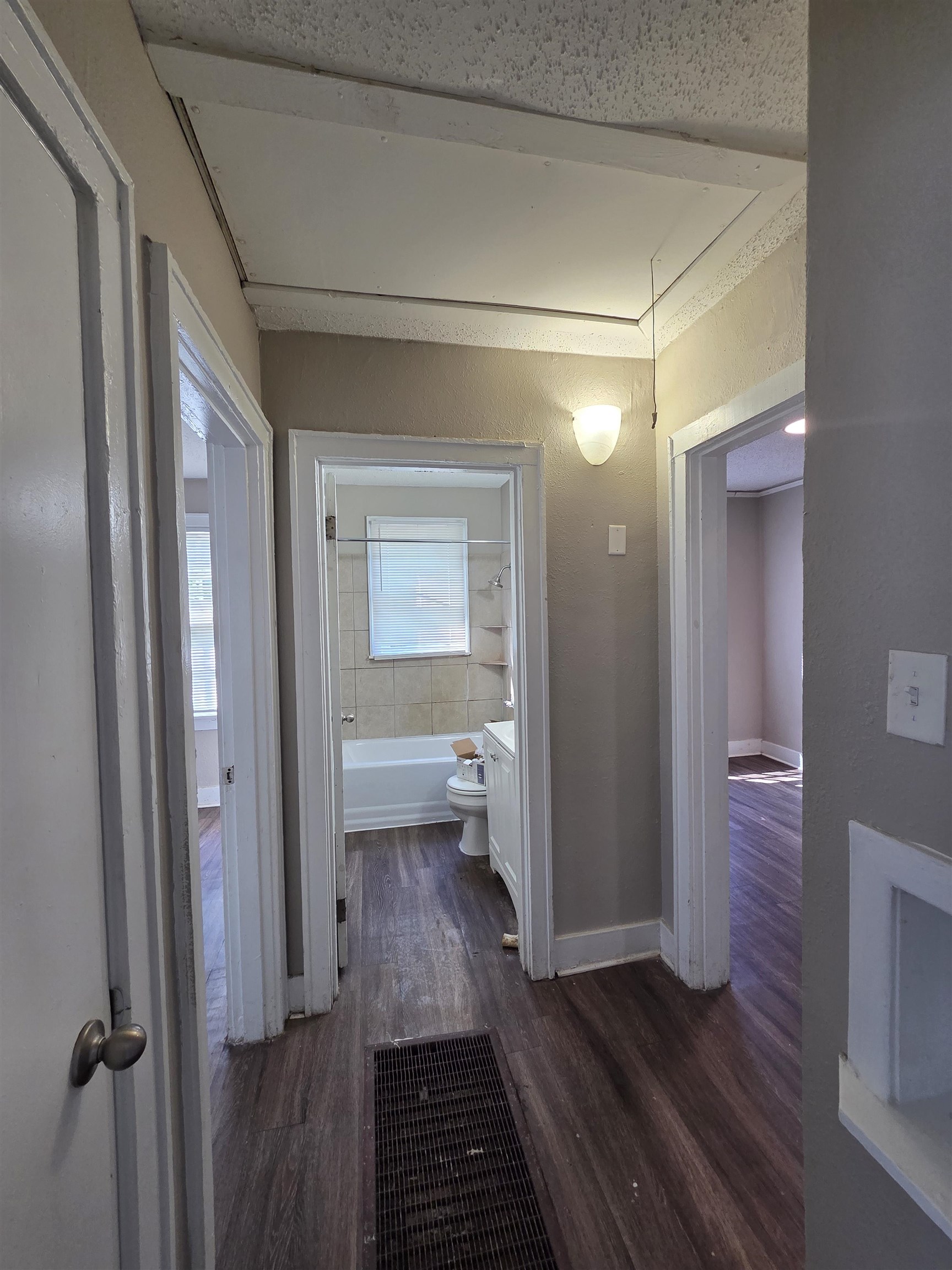 775 Pope Street Memphis, TN 38112 - Photo 11 of 13 a view of a bathroom with a sink and a mirror