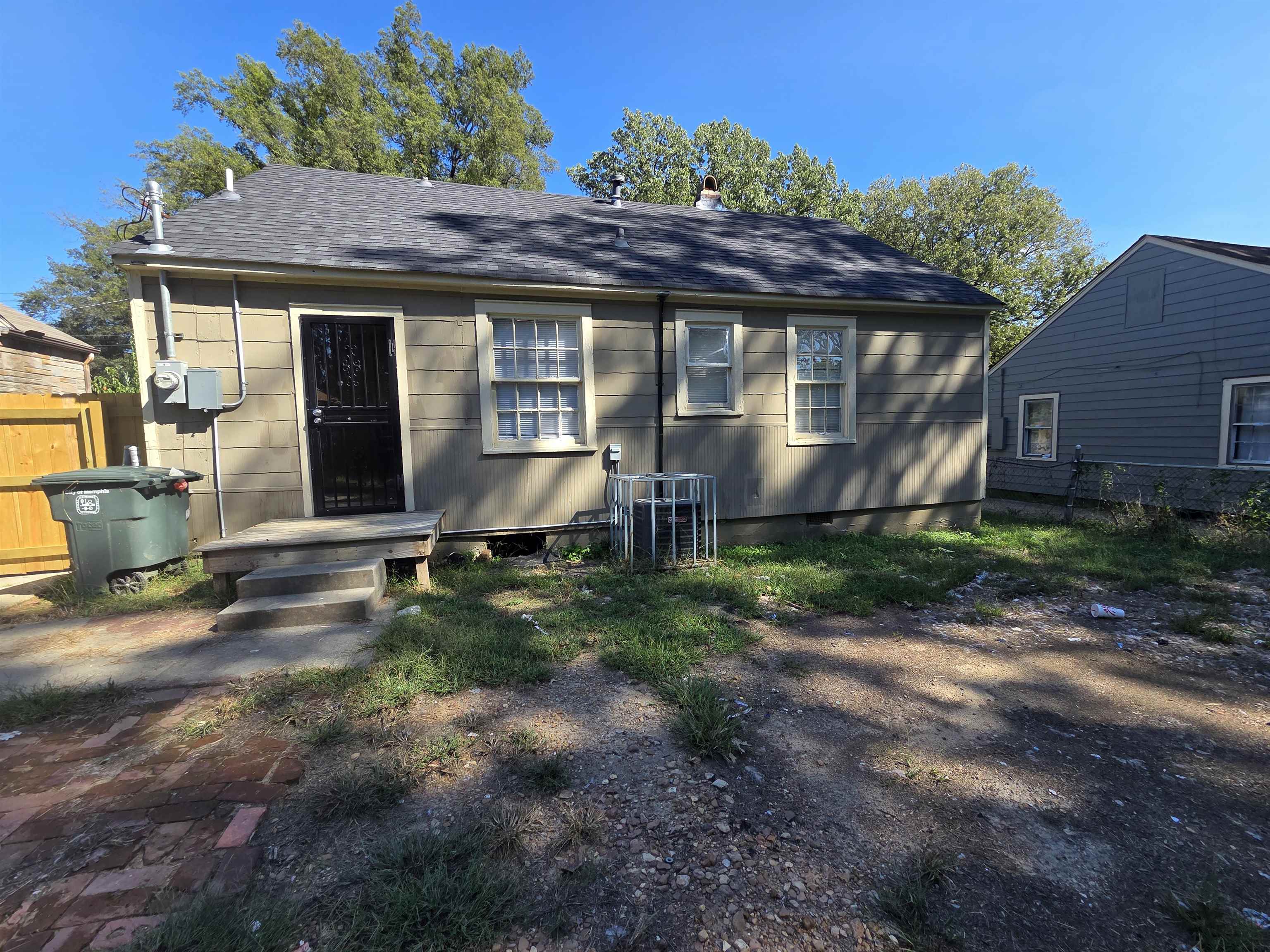 775 Pope Street Memphis, TN 38112 - Photo 13 of 13 a front view of a house with garden