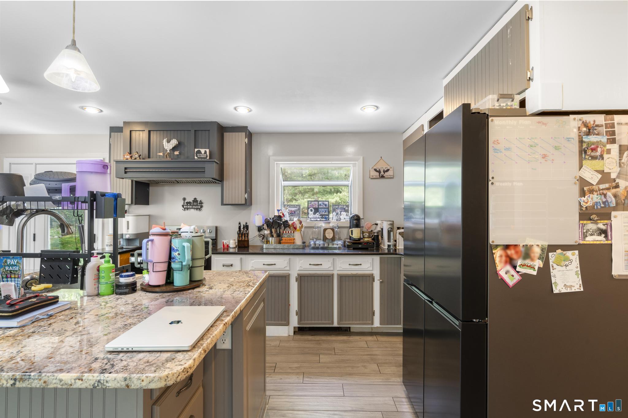 13 Christy Hill Road Ledyard, CT 06335 - Photo 10 of 38 a kitchen with stainless steel appliances granite countertop a refrigerator and sink