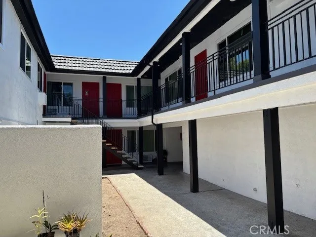 a view of a building with sitting area
