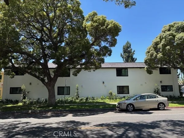 a view of street with parked cars