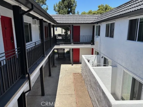 a balcony with seating space