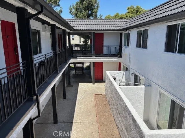 a balcony with seating space