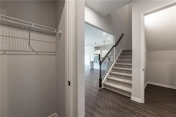 a bathroom with a toilet and a bathtub