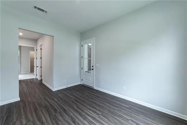 an empty room with windows