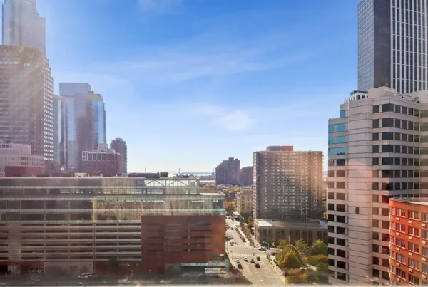 a view of a city with tall buildings