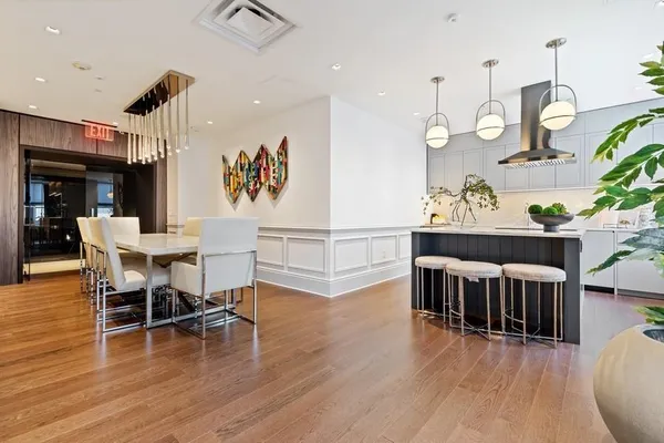 a view of living room with furniture and flat screen tv