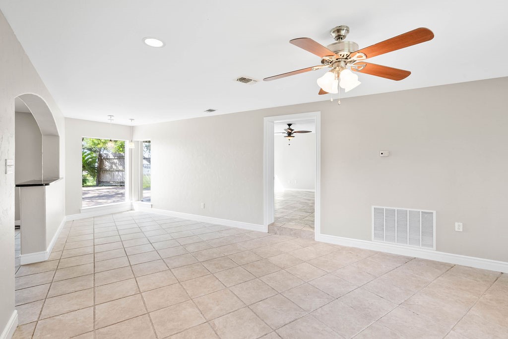 1931 North Fulton Beach Road Rockport, TX 78382 - Photo 24 of 40 an empty room with fan and windows