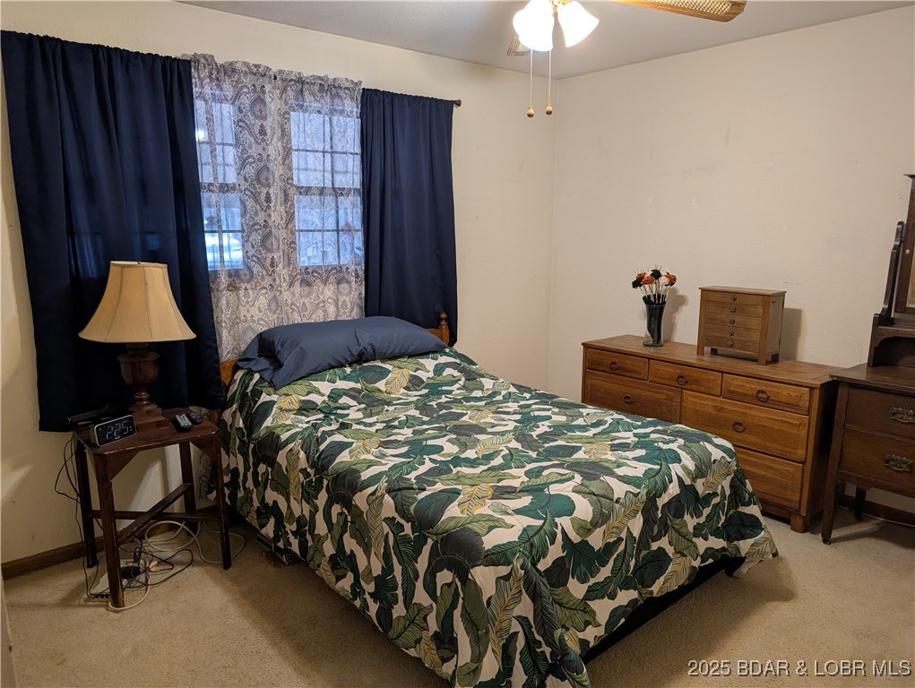 722 Riley Ridge Road Linn Creek, MO 65052 - Photo 26 of 52 One of two bedrooms upstairs