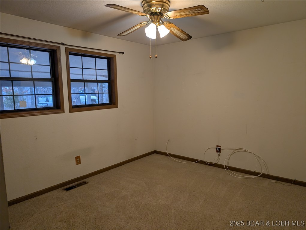 722 Riley Ridge Road Linn Creek, MO 65052 - Photo 28 of 52 Bedroom 1 without furniture- carpet cleaned
