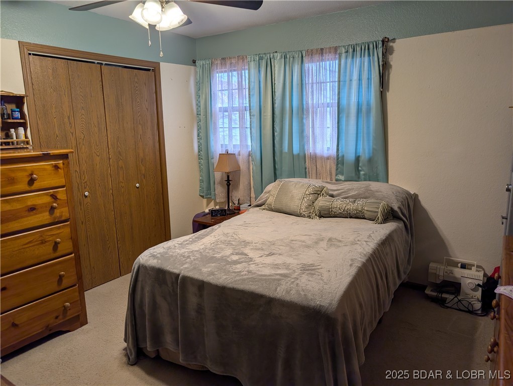 722 Riley Ridge Road Linn Creek, MO 65052 - Photo 31 of 52 Bedroom 2 - has lots of funriture in it - same siz