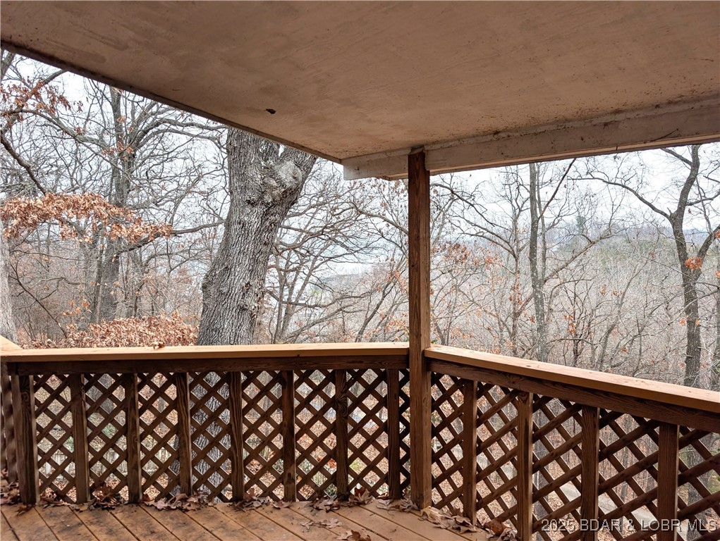 722 Riley Ridge Road Linn Creek, MO 65052 - Photo 33 of 52 Back upper covered deck