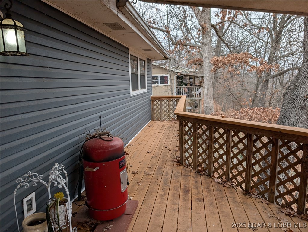 722 Riley Ridge Road Linn Creek, MO 65052 - Photo 34 of 52 Back upper deck