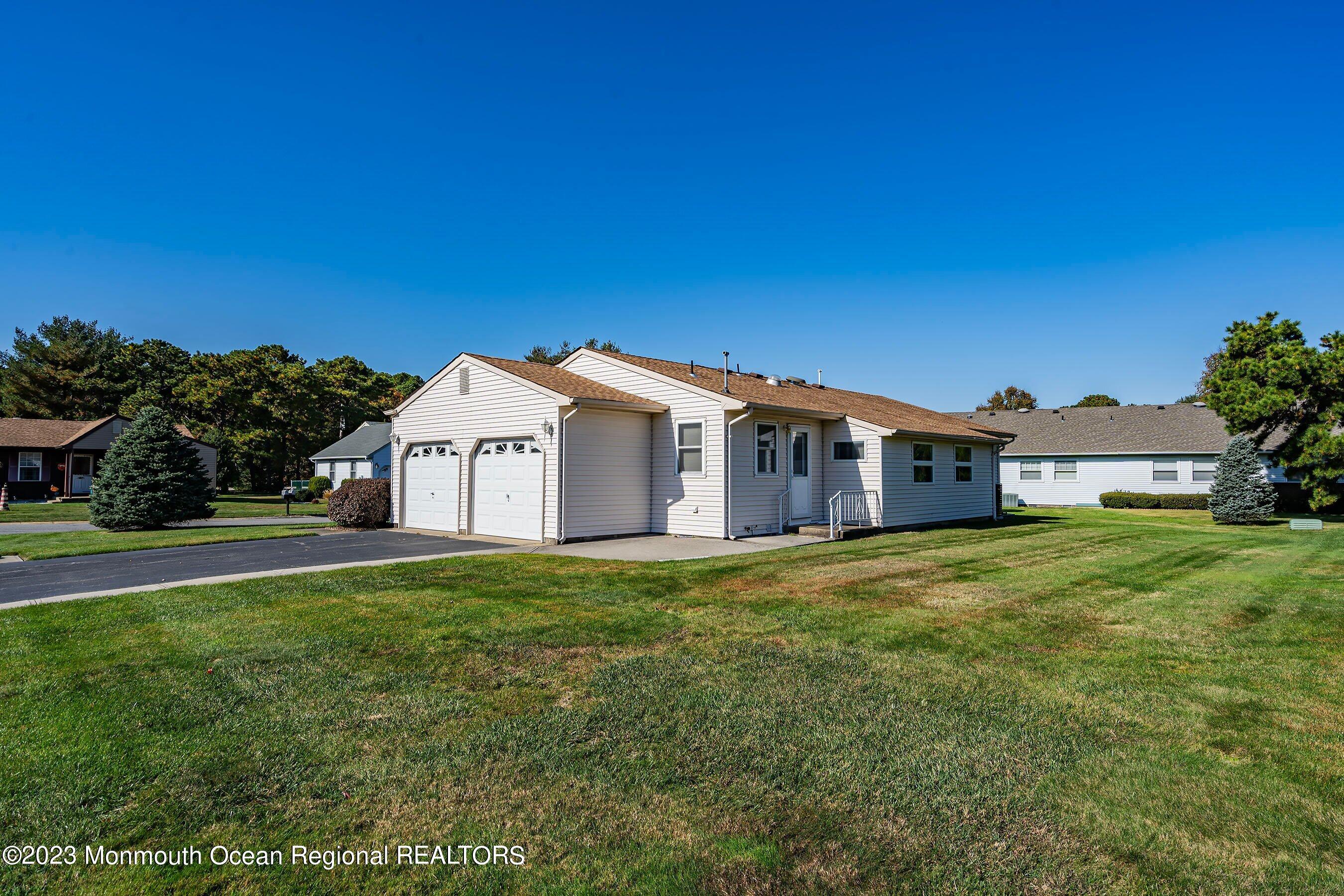 9 Amherst Road, Unit 64 Whiting, NJ 08759 - Photo 26 of 30 a house with a big yard
