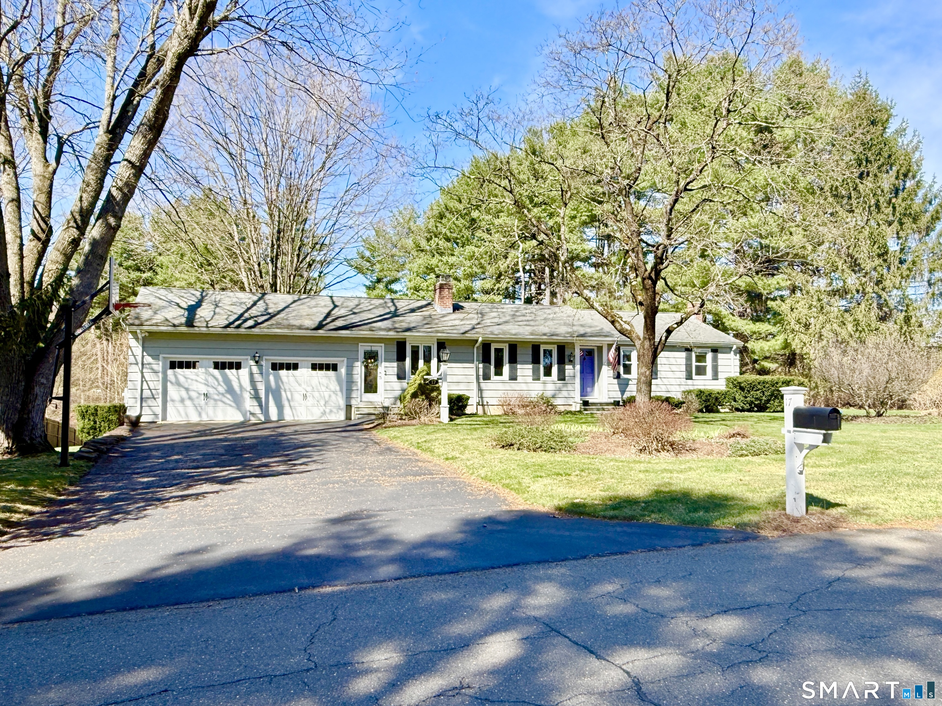 17 Sunnybrook Drive Avon, CT 06001 - Photo 1 of 40 a front view of a house with swimming pool