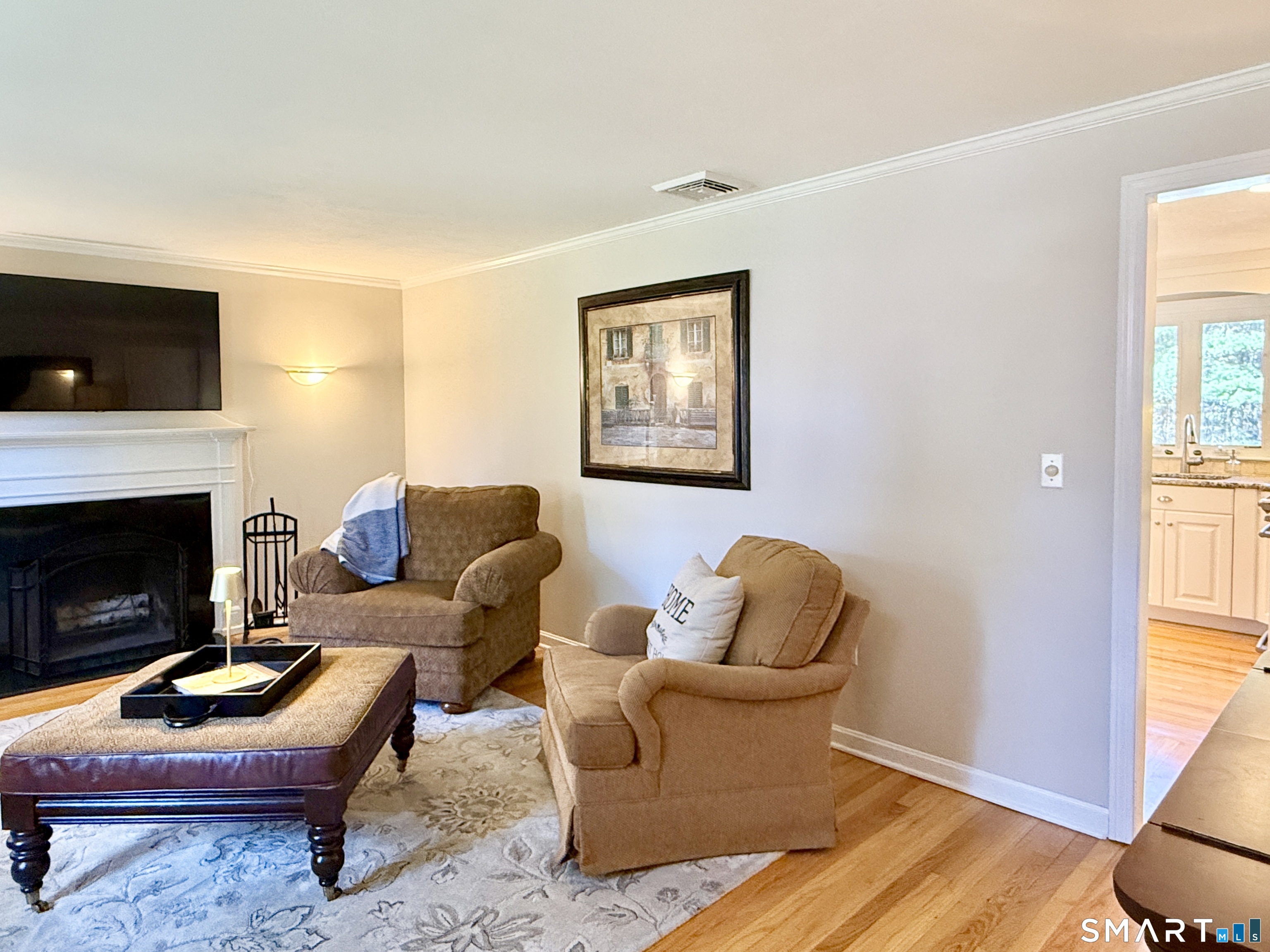 17 Sunnybrook Drive Avon, CT 06001 - Photo 16 of 40 a living room with furniture and a fireplace
