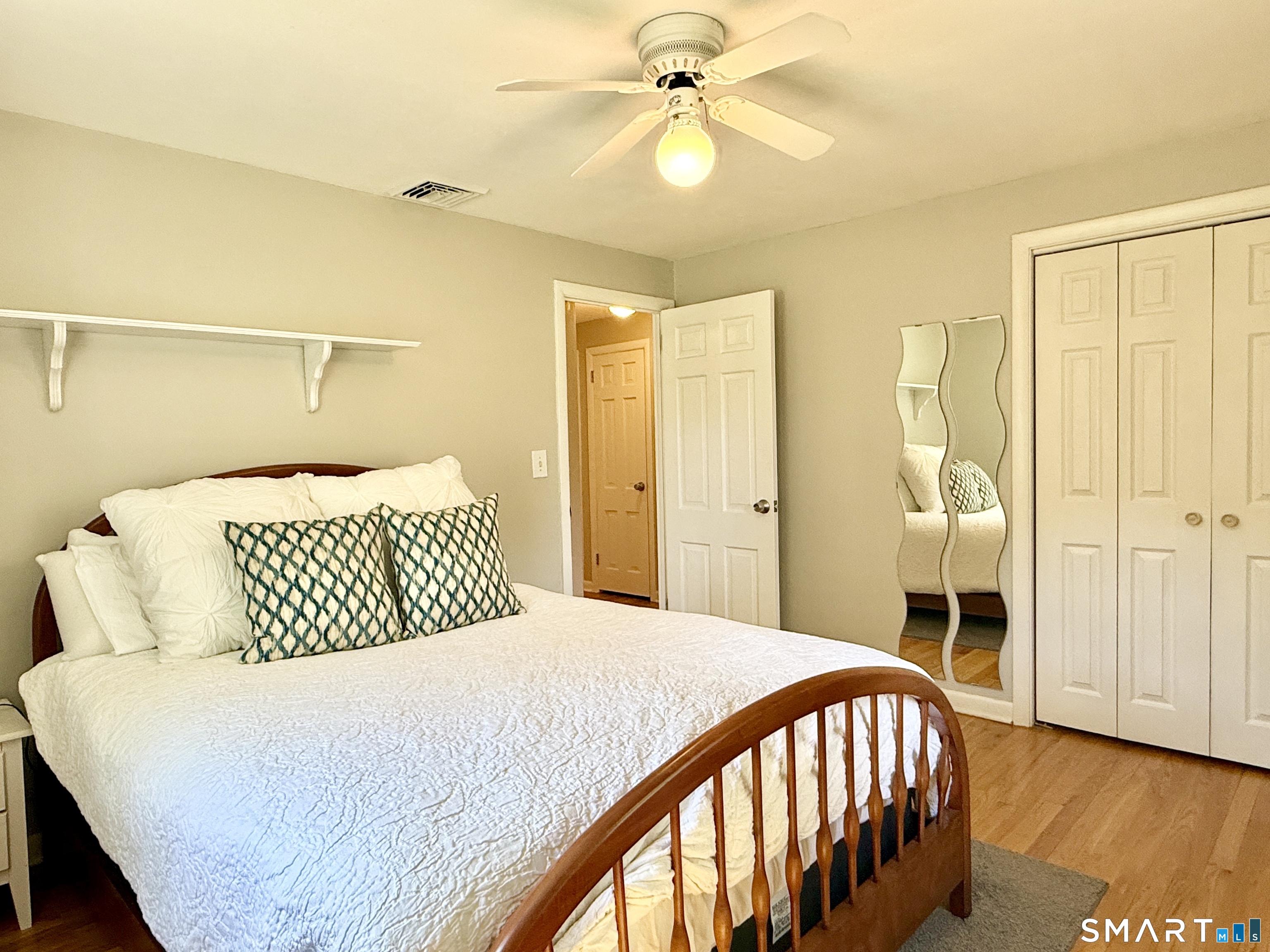 17 Sunnybrook Drive Avon, CT 06001 - Photo 23 of 40 a bedroom with a bed and wooden floor