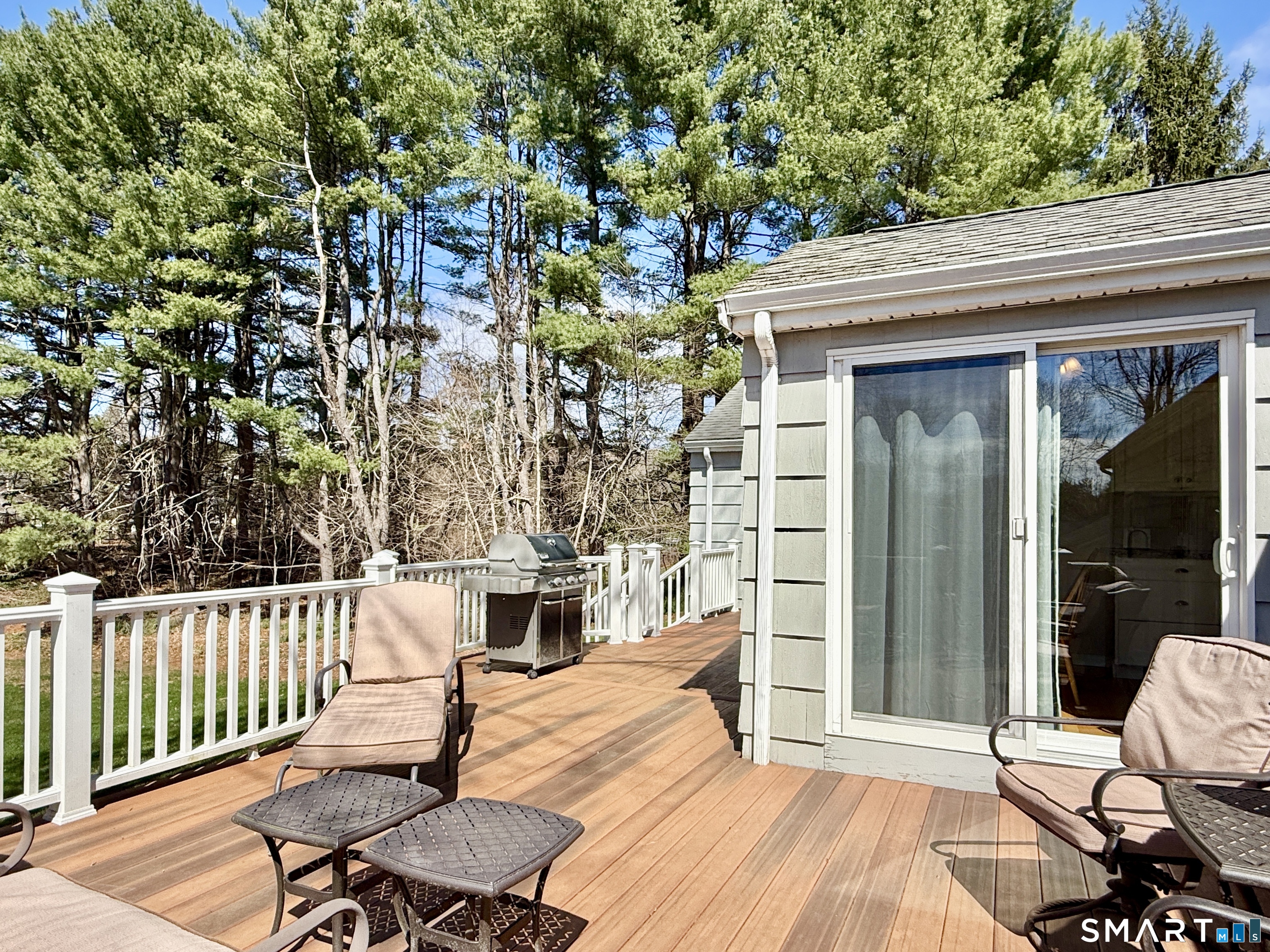 17 Sunnybrook Drive Avon, CT 06001 - Photo 35 of 40 a porch with seating space and yard in the back