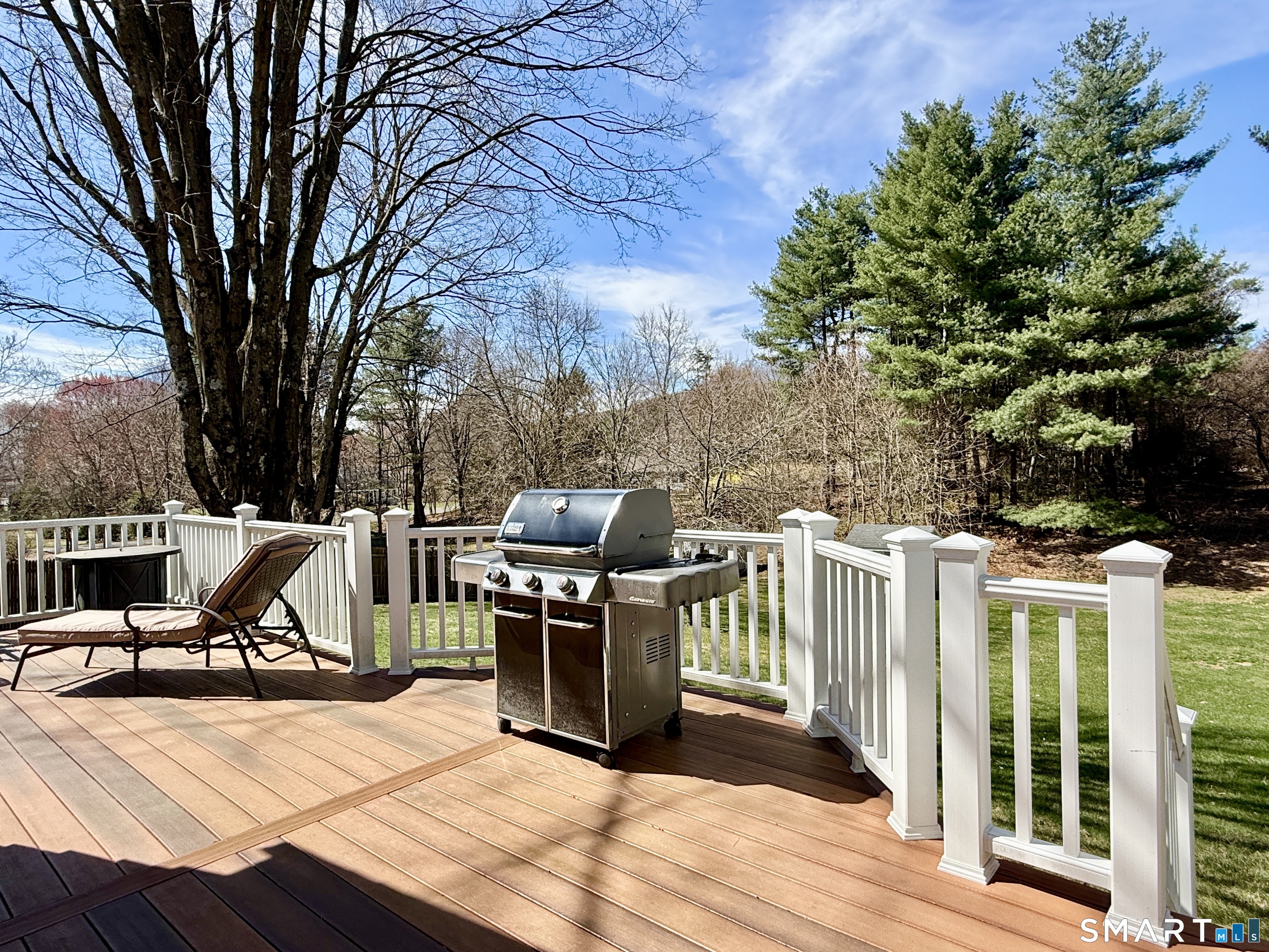 17 Sunnybrook Drive Avon, CT 06001 - Photo 36 of 40 a view of a chairs and table in the wooden floor