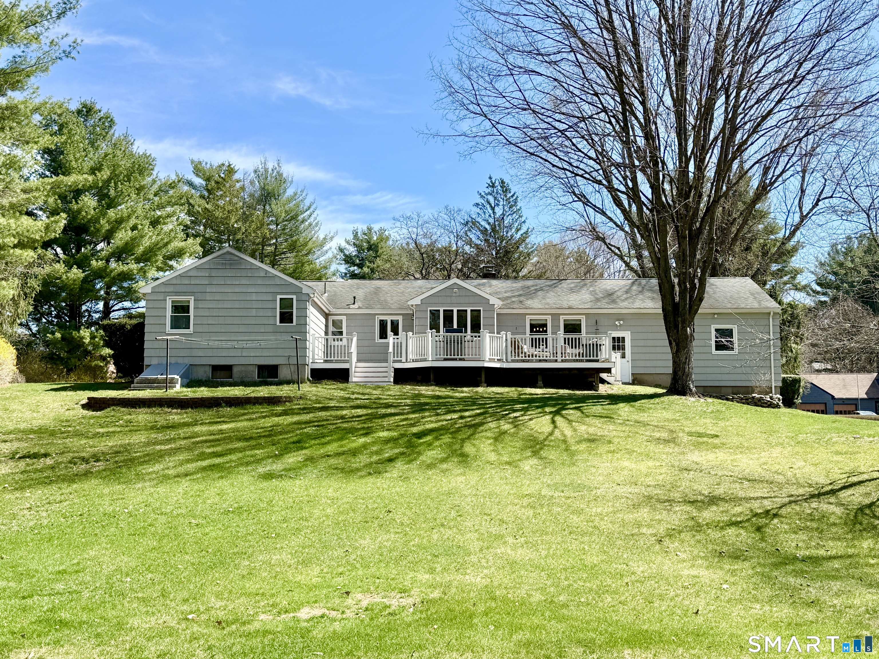 17 Sunnybrook Drive Avon, CT 06001 - Photo 37 of 40 a front view of a house with a garden