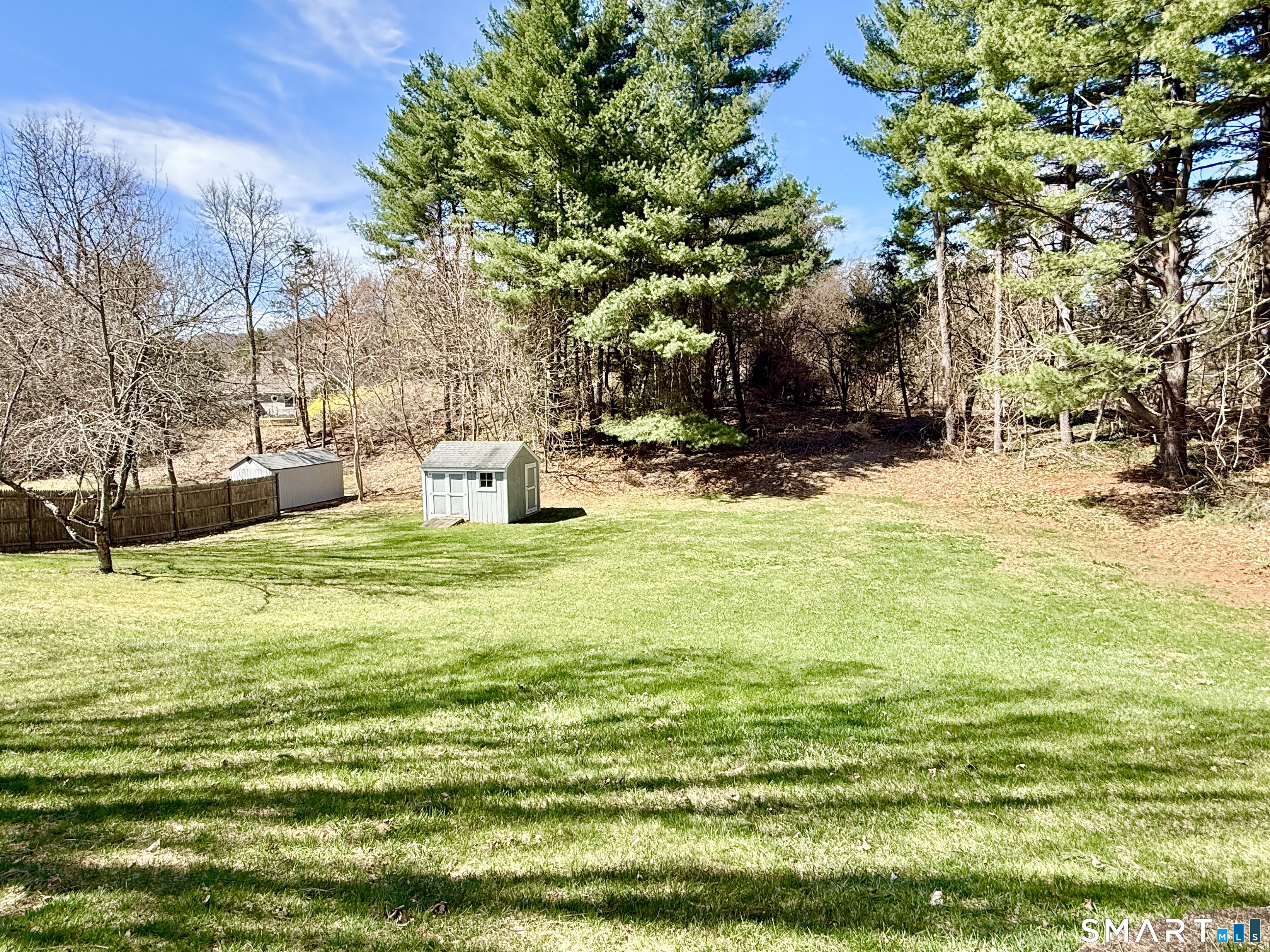 17 Sunnybrook Drive Avon, CT 06001 - Photo 38 of 40 a view of a fountain in the middle of the garden