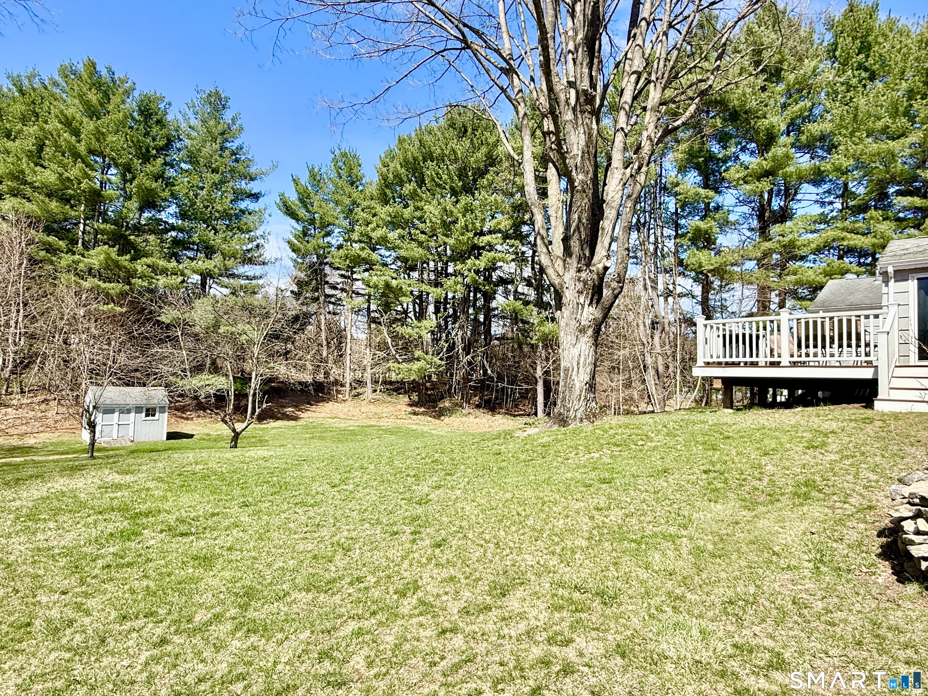 17 Sunnybrook Drive Avon, CT 06001 - Photo 39 of 40 a house with trees in the background
