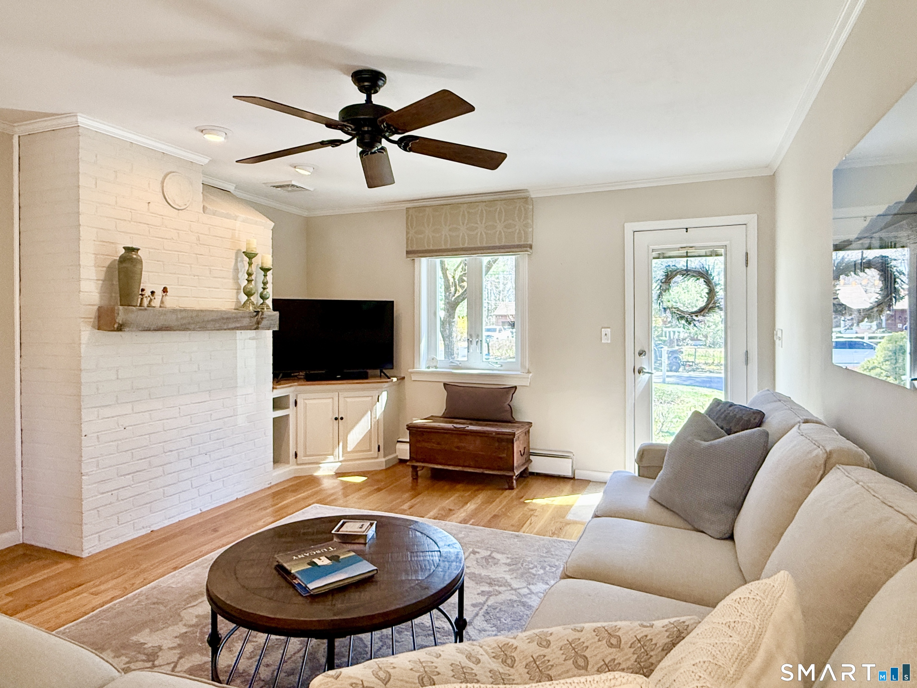 17 Sunnybrook Drive Avon, CT 06001 - Photo 5 of 40 a living room with furniture and a flat screen tv