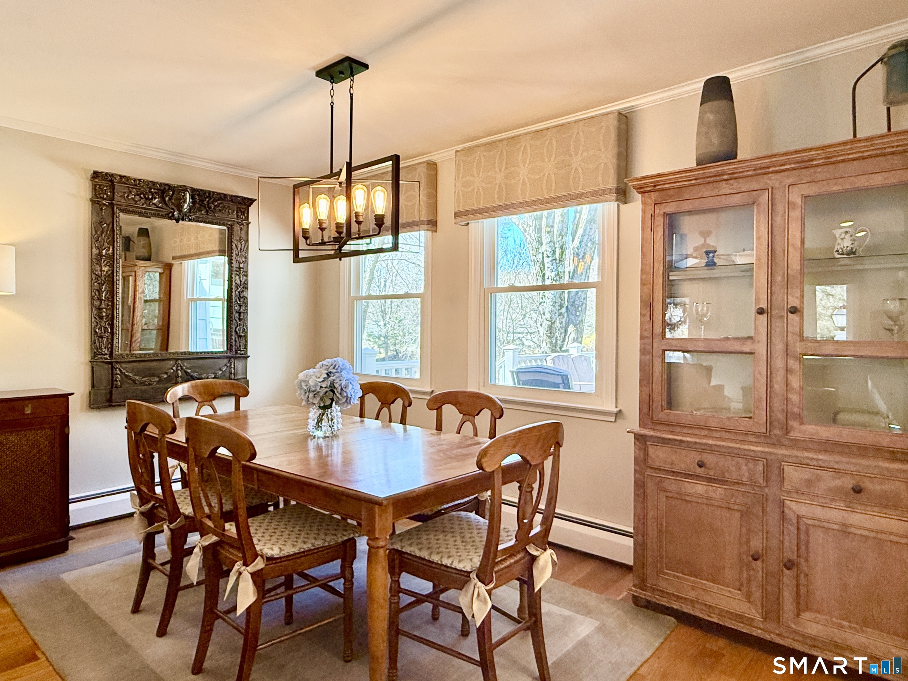 17 Sunnybrook Drive Avon, CT 06001 - Photo 6 of 40 a view of a dining room with furniture window and outside view