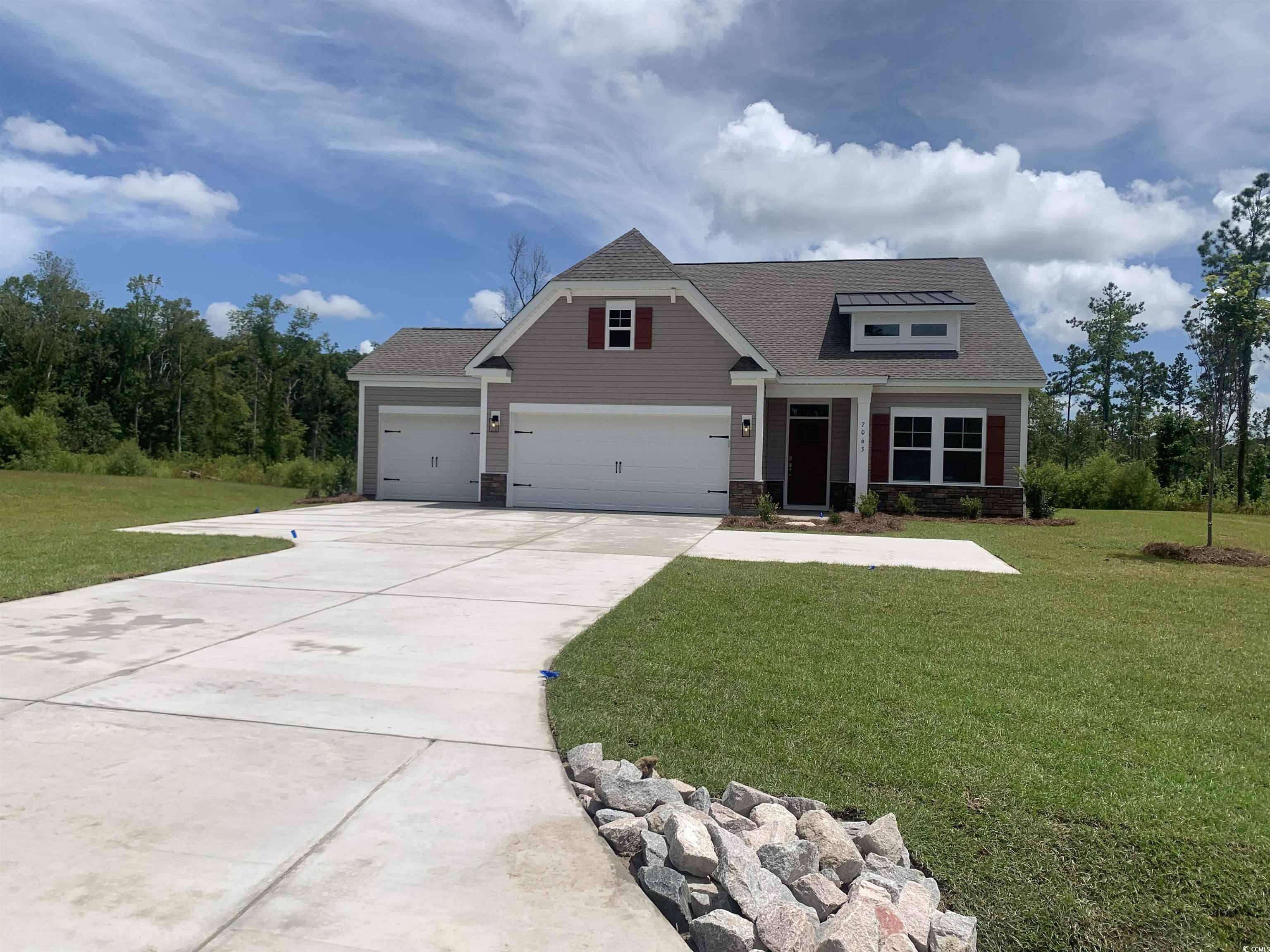 7063 Shady Grove Road Conway, SC 29527 - Photo 1 of 2 Craftsman inspired home with stone siding, drivewa