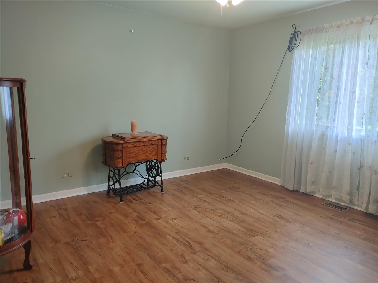 310 Rochester Road Northeast Poplar Grove, IL 61065 - Photo 15 of 19 a bench sitting in a room next to a window