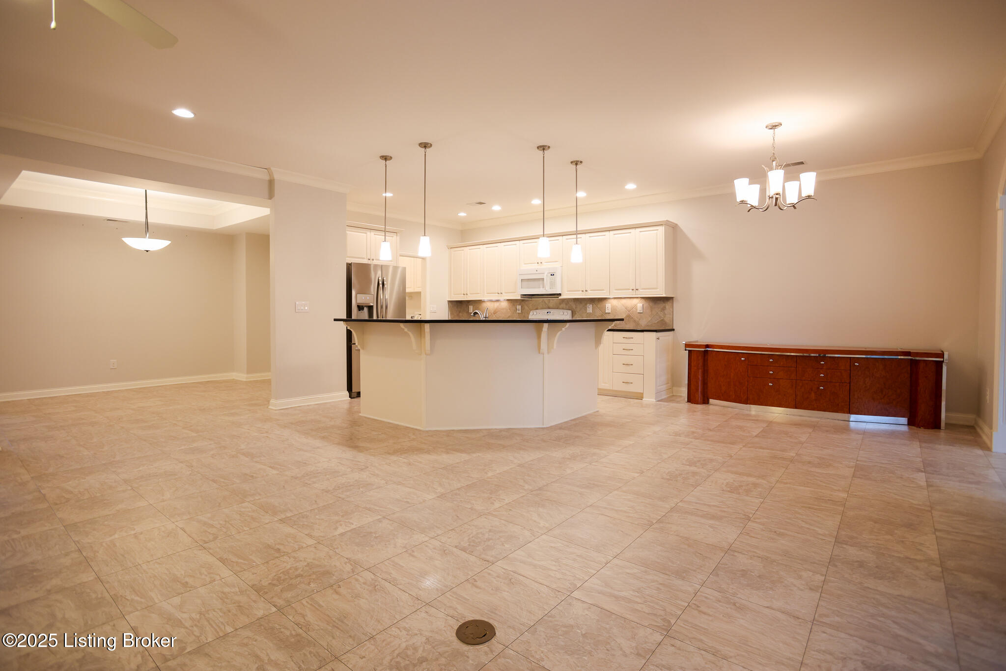 10712 Riva Road Louisville, KY 40223 - Photo 6 of 25 Kitchen island is an inviting informal area to gather